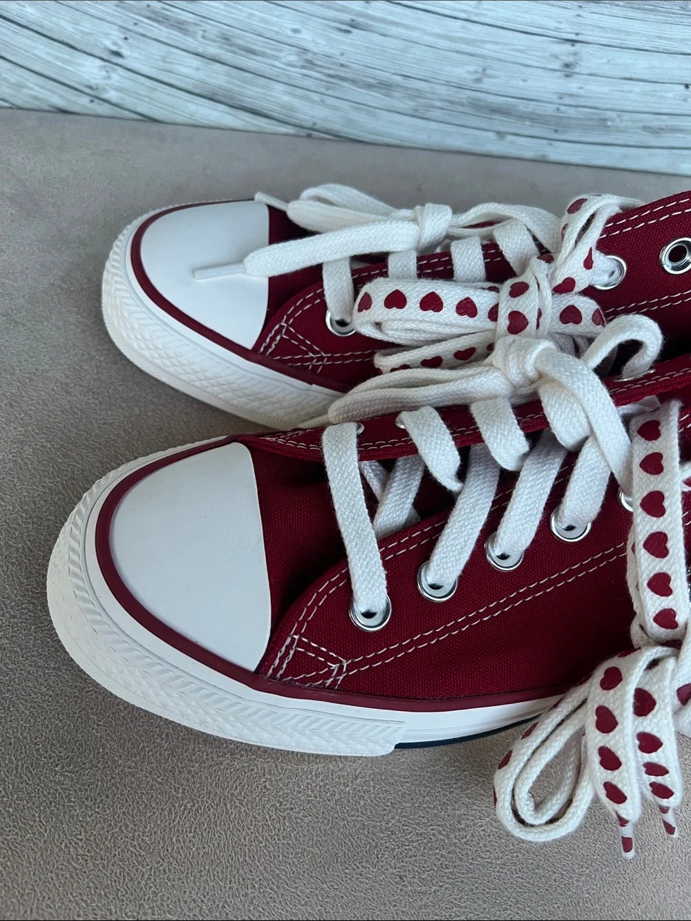 Converse Women's Low Top Sneakers in Burgundy with Heart-Print Laces